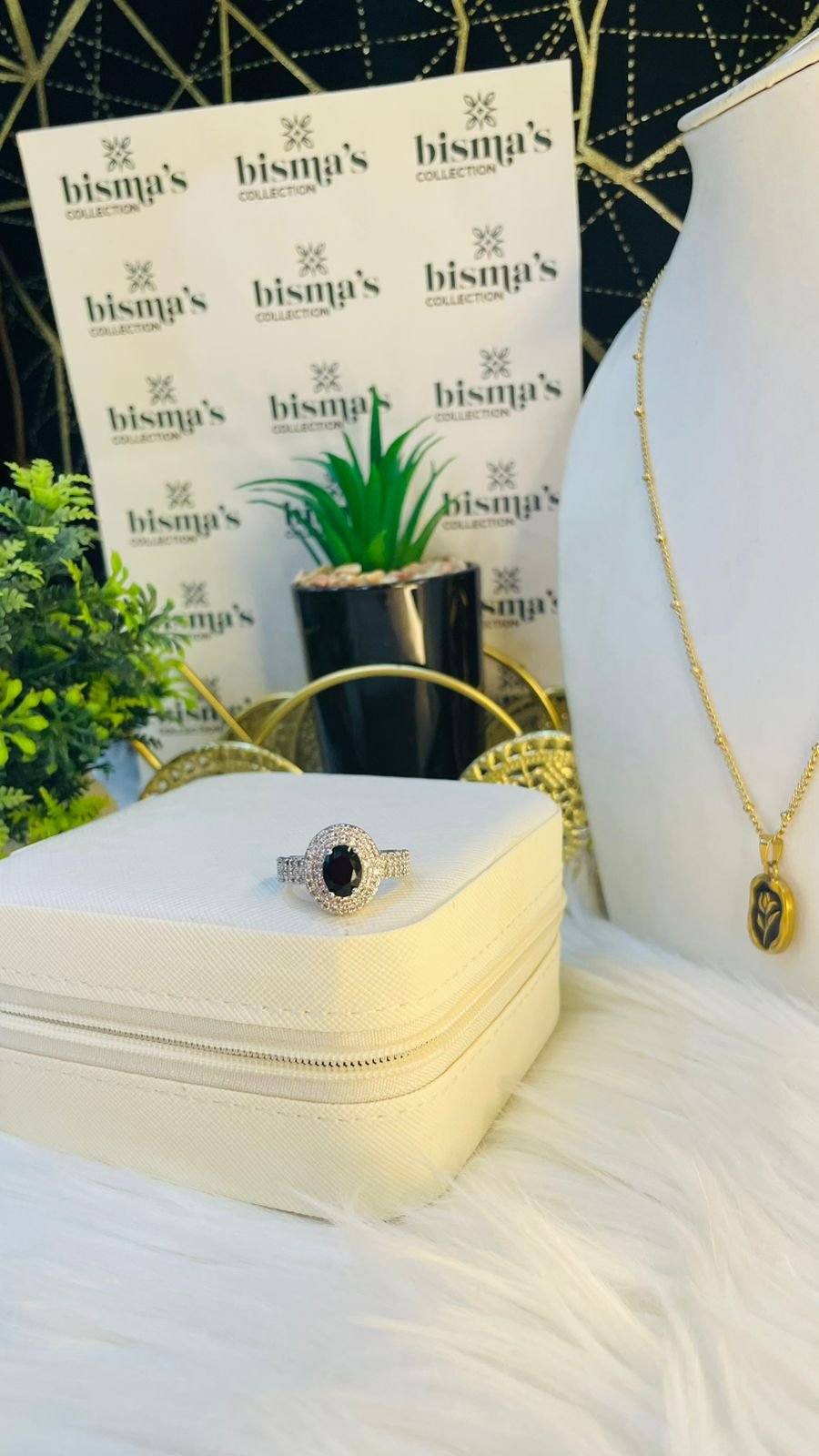 silver ring with black stone